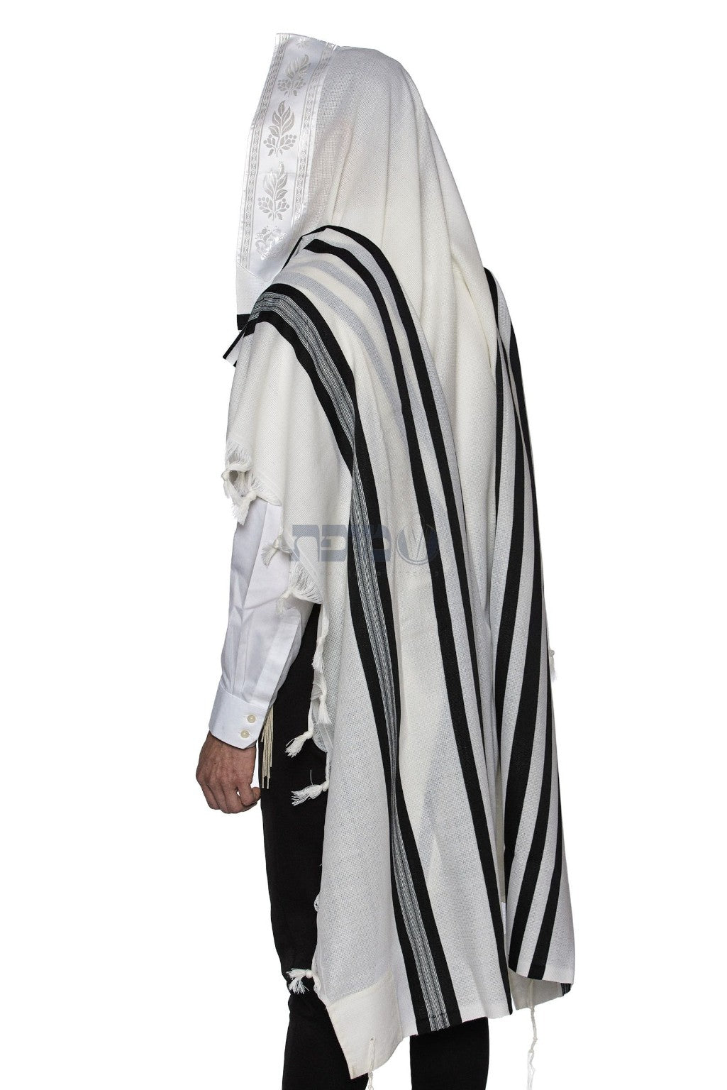 Black striped machine-made tallit worn over the head and shoulders