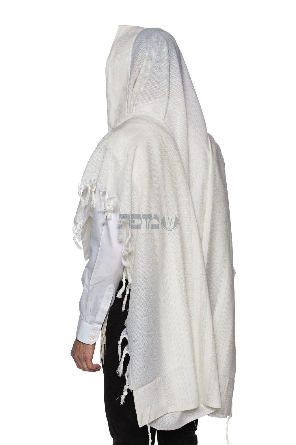 White-on-white tallit worn over the head and shoulders